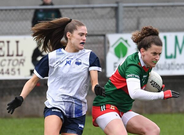 Mayo’s Kathryn Sullivan holds onto the ball despite the close marking of Waterford’s Katie Murray during the Lidl Ladies NFL Division 1 tie at James Stephens Park, Ballina, last Sunday. Picture: David Farrell Photography Mayo’s Kathryn Sullivan holds onto the ball despite the close marking of Waterford’s Katie Murray during the Lidl Ladies NFL Division 1 tie at James Stephens Park, Ballina, last Sunday. Picture: David Farrell Photography