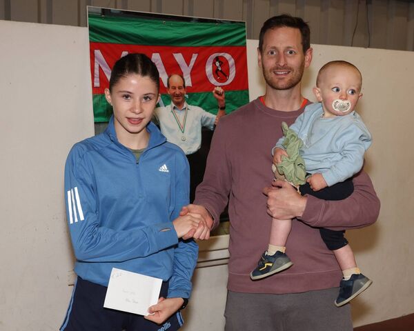 Ellen Trench receives her junior girls prize from Eoin Waldron. Ellen Trench receives her junior girls prize from Eoin Waldron.