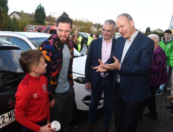 Tánaiste Micheál Martin chats with Padaig and Caiden O'Hora while canvassing in Ballina on Sunday with Minister of State Dara Calleary TD. Picture: John O'Grady Tánaiste Micheál Martin chats with Padaig and Caiden O'Hora while canvassing in Ballina on Sunday with Minister of State Dara Calleary TD. Picture: John O'Grady