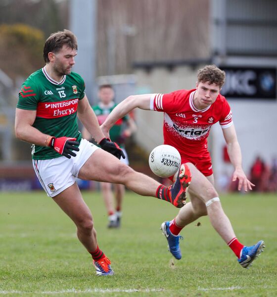 Mayo's Aidan O’Shea, who was making his 85th appearance in the National Football League, takes a solo while under pressure from Derry’s Eoin McEvoy. Mayo's Aidan O’Shea, who was making his 85th appearance in the National Football League, takes a solo while under pressure from Derry’s Eoin McEvoy.
