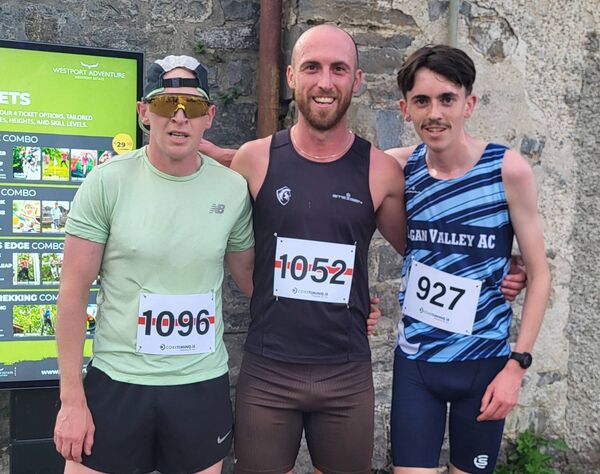The top three men in the Westport 5k were, from left: Alan Dunne, Swinford AC (3rd), Mitch Thompson, Dark Horse Track Club (1st) and Ruairi Hollywood, Lagan Valley AC (3rd). The top three men in the Westport 5k were, from left: Alan Dunne, Swinford AC (3rd), Mitch Thompson, Dark Horse Track Club (1st) and Ruairi Hollywood, Lagan Valley AC (3rd).