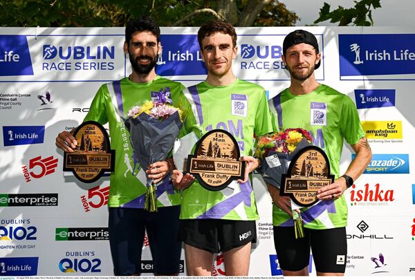 Race winner Pierre Murchan of Dublin City Harriers, centre, with second place Hugh Armstrong of Ballina AC, left, and third place Stephen McAuley of Letterkenny AC, Donegal, on the podium after the Irish Life Dublin Race Series Frank Duffy 10 Mile in Phoenix Park, Dublin. Race winner Pierre Murchan of Dublin City Harriers, centre, with second place Hugh Armstrong of Ballina AC, left, and third place Stephen McAuley of Letterkenny AC, Donegal, on the podium after the Irish Life Dublin Race Series Frank Duffy 10 Mile in Phoenix Park, Dublin.