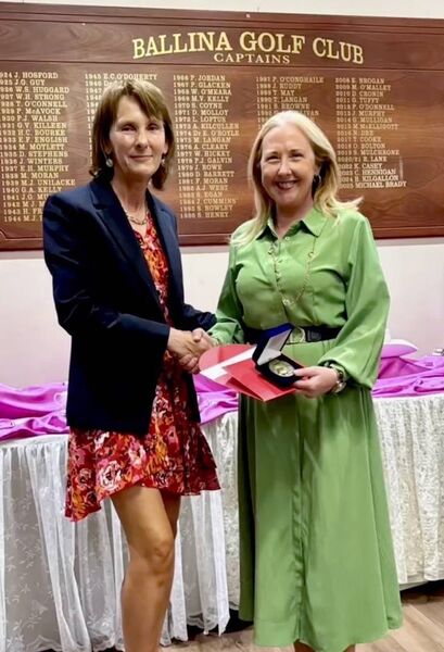 Sinead Fox (right) receives her prize from Ann Cawley, the Lady Captain of Ballina Golf Club, following her triumph at last month’s Ladies Captain’s Prize. Sinead Fox (right) receives her prize from Ann Cawley, the Lady Captain of Ballina Golf Club, following her triumph at last month’s Ladies Captain’s Prize.