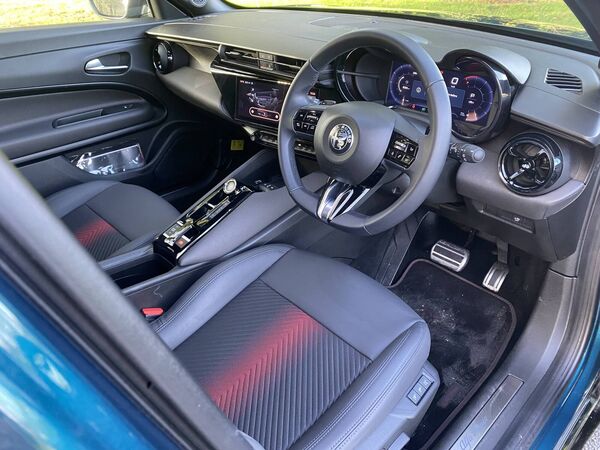 The dash is busy with lots of features, especially the 10.25-inch touchscreen infotainment screen, angled towards the driver for easy viewing. The dash is busy with lots of features, especially the 10.25-inch touchscreen infotainment screen, angled towards the driver for easy viewing.