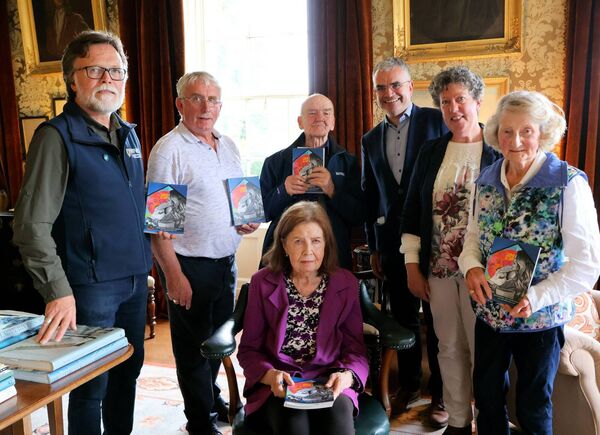 At the official launch of the Táin Bó Fliodhaise Cattle Raid of Mayo Heritage Trail were Denis Strong (NPWS), Uinsíonn Mac Graith, Micheál Ó Seighin, Minister Dara Calleary, Treasa Ní Ghearraigh, Carmel Hughes and Pearl King (seated) (photo: Máire Ní Fhalliún) At the official launch of the Táin Bó Fliodhaise Cattle Raid of Mayo Heritage Trail were Denis Strong (NPWS), Uinsíonn Mac Graith, Micheál Ó Seighin, Minister Dara Calleary, Treasa Ní Ghearraigh, Carmel Hughes and Pearl King (seated) (photo: Máire Ní Fhalliún)