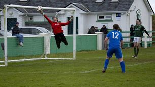 <p>Claremorris goalkeeper Peter Murphy saves from Jesse Devers (not in picture) with Ballina Town’s Jamie Moyles (12) ready if the ball rebounds. Pictures: John Corless</p> <p>Claremorris goalkeeper Peter Murphy saves from Jesse Devers (not in picture) with Ballina Town’s Jamie Moyles (12) ready if the ball rebounds. Pictures: John Corless</p>