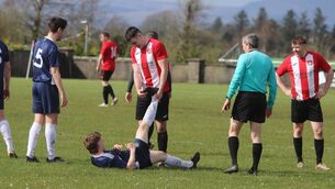 <p>Sportsmanship at its very best! Ballyglass FC striker Jack Keane comes to the aid of Glenhest player Cathal Chambers who had a severe cramp problem in a recent match. Picture by Tom Quinn</p> <p>Sportsmanship at its very best! Ballyglass FC striker Jack Keane comes to the aid of Glenhest player Cathal Chambers who had a severe cramp problem in a recent match. Picture by Tom Quinn</p>