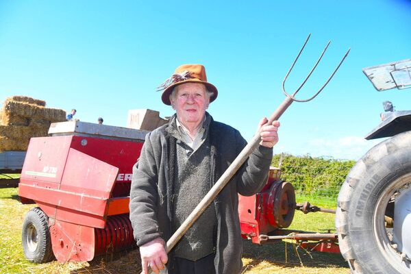 Frank Flannelly has been operating a thresher for over 50 years. Frank Flannelly has been operating a thresher for over 50 years.