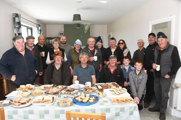 Keeping alive the true spirit of the 'meitheal', the the workers enjoyed a fine feed after the threshing. Pictures: John O'Grady Keeping alive the true spirit of the 'meitheal', the the workers enjoyed a fine feed after the threshing. Pictures: John O'Grady