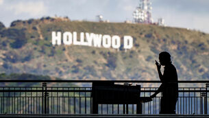 <p>A worker wheels equipment past the famous Hollywood sign as preparations continue on March 8, 2023, for the 95th Academy Awards, which took place against the backdrop of an industrial-wide strike. Picture: AP Photo/J. David Ake</p> <p>A worker wheels equipment past the famous Hollywood sign as preparations continue on March 8, 2023, for the 95th Academy Awards, which took place against the backdrop of an industrial-wide strike. Picture: AP Photo/J. David Ake</p>