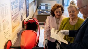 <p>Bernadette and Marie Moran, Westport, photographed with Liam Doherty, Curator, Irish Folklife Division, National Museum of Ireland, at the Soap Box car which was driven by their brother Joseph Moran in 1956. Picture: Karen Cox</p> <p>Bernadette and Marie Moran, Westport, photographed with Liam Doherty, Curator, Irish Folklife Division, National Museum of Ireland, at the Soap Box car which was driven by their brother Joseph Moran in 1956. Picture: Karen Cox</p>