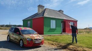 <p>Belmullet man John Shevlin, known for driving the famous ‘Up Mayo’ green and red Ford Focus, is painting his house in the county colours for the week that’s in it.</p> <p>Belmullet man John Shevlin, known for driving the famous ‘Up Mayo’ green and red Ford Focus, is painting his house in the county colours for the week that’s in it.</p>