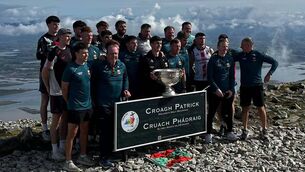 <p>Mayo team and management pictured with Sam Maguire at the top of Croagh Patrick . Picture: Tuam Archdiocese</p> <p>Mayo team and management pictured with Sam Maguire at the top of Croagh Patrick . Picture: Tuam Archdiocese</p>