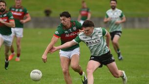 <p>Kilmaine's Adam Barrett and Islandeady's Liam Coyne compete for possession during their Egan Jewellers Mayo IFC Round 3 clash in Cong. Picture: Conor McKeown</p> <p>Kilmaine's Adam Barrett and Islandeady's Liam Coyne compete for possession during their Egan Jewellers Mayo IFC Round 3 clash in Cong. Picture: Conor McKeown</p>