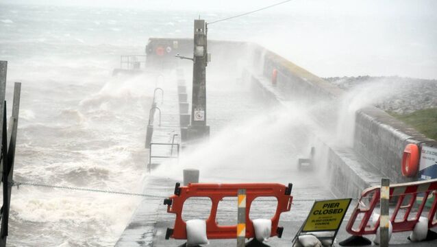 Waves battering a pier during Storm Amy. Picture: John O'Grady <p>Waves battering a pier during Storm Amy. Picture: John O'Grady</p>